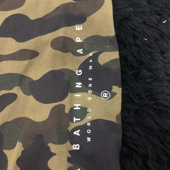 A BATHING APE GREEN 1ST CAMO SWEATS W/ EMBROIDERED LETTERS IN WHITE SZ. M